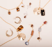 Michelle Starbuck Designs - Tortoise Glass & Sunburst Charm Necklace: 18"