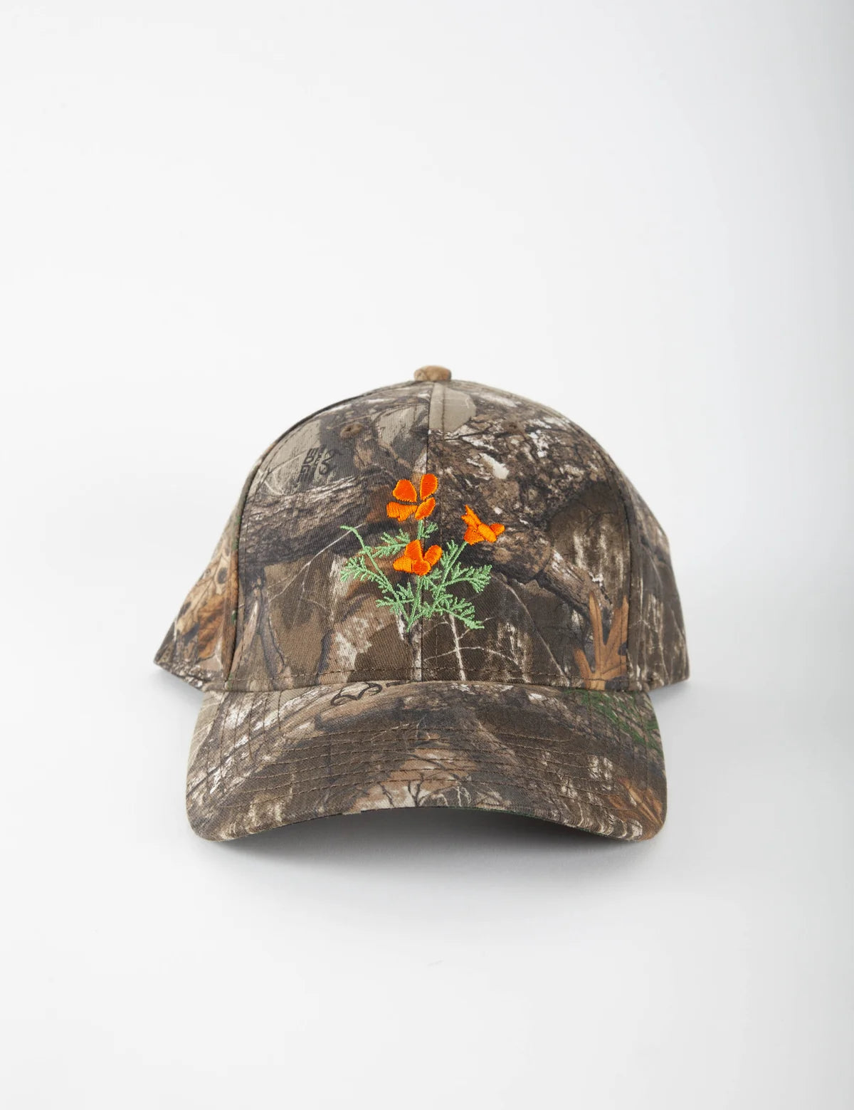 Poppy_Cap_Real_Tree_Camo_1800x1800_32faaacd-eff0-4485-8831-bd3ff3b1756e.webp